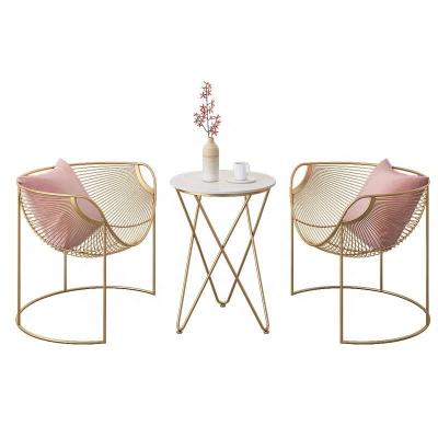 China Factory Price Waterproof Morden Dining Chair Gold Stainless Steel Wrought Iron Dining Chair Cavity Wire Design Outdoor Cafe Chair for sale