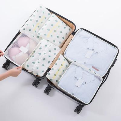 China Fashion 7pcs Waterproof Travel Packing Cube Clothing Storage Bags Matching Compression Luggage Packing Cube Organizer for sale