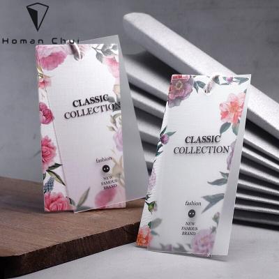 China Sustainable high quality embossed with foiled and printing customized plastic label paper label clothes hanger tag for jeans clothing and shoes for sale