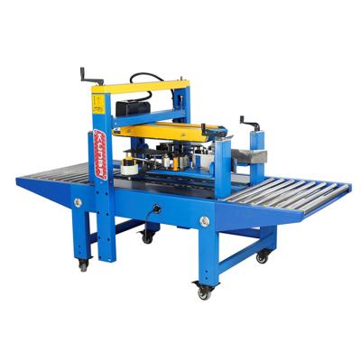 China Semi Automatic CLOTHING KUNBA Bottom Sealing Machine Adhesive Tape Carton Box Top Sealer for sale