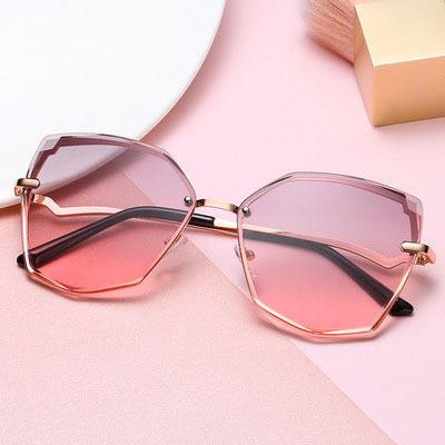 China 15 Years Experience New Trend Fashion Metal Frame Sunglasses Rimless Personality Two Color Glass Polygonal Cut Lenses for sale