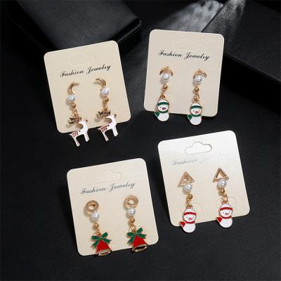 China New Elk Christmas Tree Snowman Casual/Sporty Shipping Christmas Bell Drop Oil Earrings Shape Soft Temperament Combination Set Earrings for sale