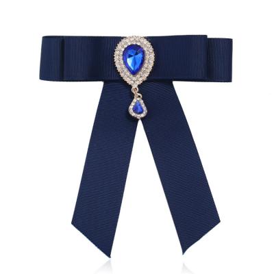 China Ribbon the latest hot sale brooch a newly designed bow-shaped luxury brooch for sale