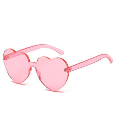 China Polarized Polarized New Fashion Sun Glasses Frame Peach Heart Glass Color Frame Ladies Regular Glasses Ladies PC Polarized Sunglasses for sale