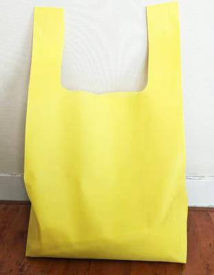 China Eco - Friendly Non Woven Reusable Biodegradable T Shirt Bag Shopping Tote Bag for sale