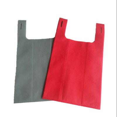 China Custom Eco-Friendly Reusable Shopping Bag Non Woven Fabric Shopping Packaging W-Cut Eco-Friendly T-Shirt For Bags for sale