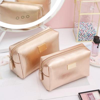 China Modella Stripe Waterproof Luxury Small Cross PU Leather Cosmetic Bag Women, Travel Rose Gold Makeup Bag Custom Private Label Metal Logo for sale