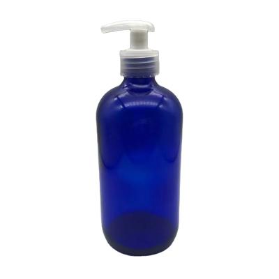 China 30ml 100ml 240ml 480ml Boston Glass Chemical Blue Bottles Round Glass Bottle With Pump for sale