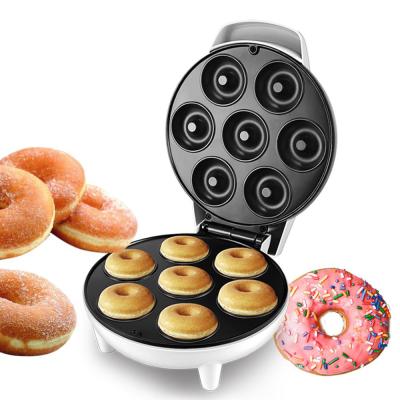 China Home Supply Commercial Mechanical Donut Breakfast Maker Machine Heating Coil Cake Making Machine 7 Donuts for sale