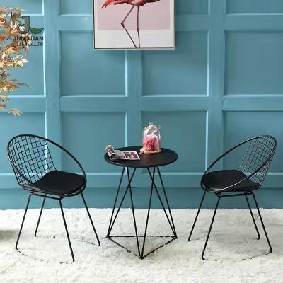 China Fashion Durable High Quality Iron Wire Hollow Frame Metal Gold Back Steel Leisure Dining Chairs Table Set for sale