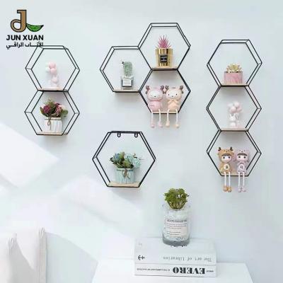 China High Quality Nordic Hexagonal Wall Hanging Shelf Home Decor Kitchen Wrought Iron Wall Shelf Home Decor for sale