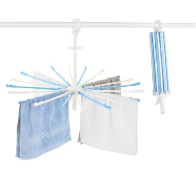 China Collapsible Baby Cloth Towel Folding Windproof Rotating Plastic Hanger / Clothing Drying Rack for sale