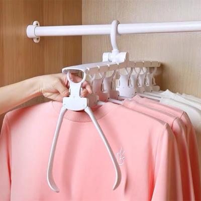 China 360 degree multi-functional multifunctional rotating 8 foldable drying hangers/pulled plastic clothes racks for sale