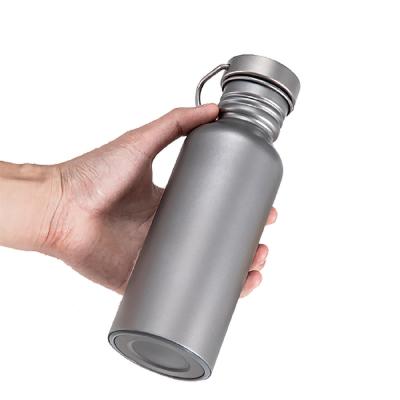 China Sustainable cylinder shaped water flask with titanium housing, with 600ML, with clip loop lid, for camping hike for sale