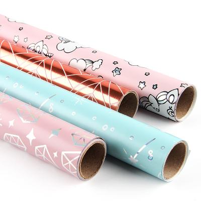 China Colorful Biodegradable Printed Luxury Christmas Gift Wrapping Paper Aluminized Luxury Wrapping Papere For Packaging for sale