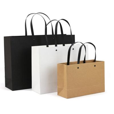 China Rivet Shopping Bag Recyclable Paper Customized Shopping Paper Bag With Handle Packaging Bags For Clothing for sale