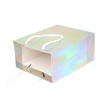 China Holographic Printing Paper Bag Wholesale Recyclable Paper Bags Hot Sale Luxury Custom Logo Paper Shopping Bag With Handle for sale