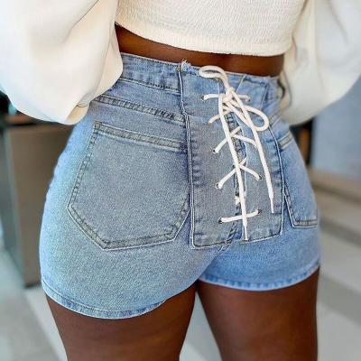 China New Summer Style QUICK DRY Solid Color Back Tie Elastic Slim Denim Shorts Women Jeans for sale