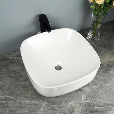 China Easy clean up; Hot Sale Soomth Sale Sanitary Ware Hotel Bathroom Ceramic White Basin Sink for sale