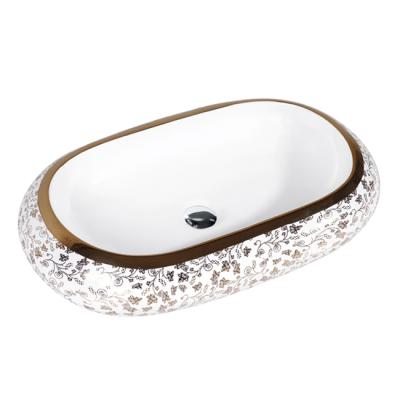 China Modern Ceramic Art Basin Ceramic Sink in Bathroom Gold Basin for sale