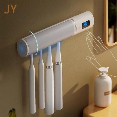 China UV Disinfection + Drying Wall Mounted Toothbrush Holder Factory Direct Sales Toothpaste Dispenser Toothbrush Holder Premium Smart Toothbrush Holder for sale