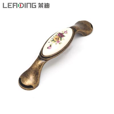 China Rustic Antique Porcelain Furniture Handle Zamak Cabinet Pulls Traditional Kitchen Dresser Pull Out for sale