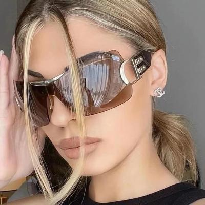 China High Quallity New Rimless One Piece Wind Proof Y2k Men Sports Cycling Sunglasses Oversized Uv400 Retro Women Sunglasses for sale