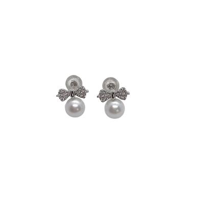 China High Quality Natural Cute Simple And Elegant Women's Style Bow And Sea Pearl 14K Gold Round Stud Earrings for sale