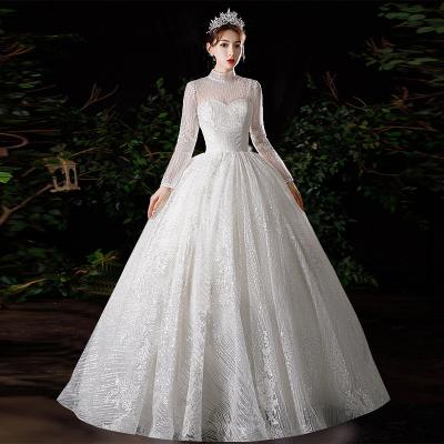 China 2021 Anti-Static Beaded Luxury Long Train Long Sleeve Ball Gown Wedding Dress Crystal Wedding Dress for sale