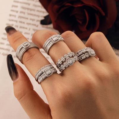 China Good Value FASHION Collection from Dylam Rhodium-Plated 925 Sterling Silver Infinite Elements 5A Zirconia Halo Stackable Wedding Rings for sale