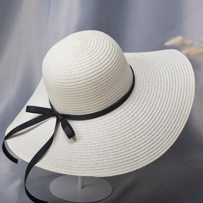 China Wide Picture Women Brim Beach Hat Bowknot Summer Sun Foldable Straw Hat for sale