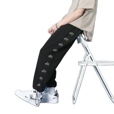 China Casual Anti-wrinkle ins drawstring leg pants for men and Korean students in autumn and winter loose butterfly print and velvet pants. for sale