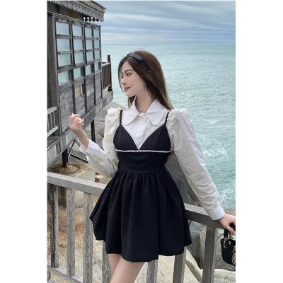 China Wholesale Anti-Static College Style Preppy Dress Set 2 Piece Bubble Sleeve Shirt Bow Suspender Skirt Top Dress for sale