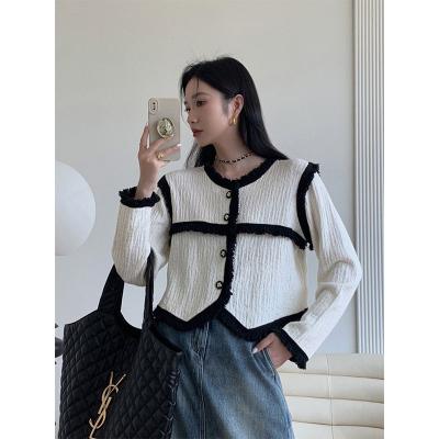 China Anti-wrinkle western style fashion all match women sweater tops loose coat tassel button cardigan sweater wholesale for sale