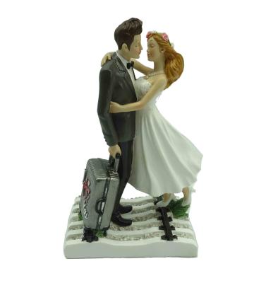 China Cake Topper Polyresin Wedding Gift Favors Wedding Cake Toppers For Bride And Groom for sale