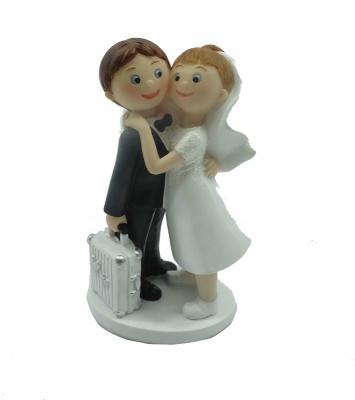 China Stunning Wedding Cake Topper Polyresin Wedding Couples Figurine Resin Cartoon Bride And Groom Decoration for sale