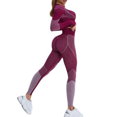 China Yoga New Fitness Set Open Long Umbilical Sleeve Sports Tight High Lift Red T-shirt Peach Hip Yoga Set for sale