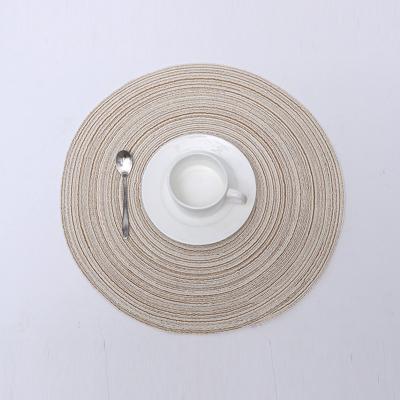 China Sustainable Round Area Rug Easy Washable To Clean Heat Waterproof Handcrafted Woven Polyester Table Mats for sale