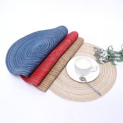 China Sustainable Round Table Mat Washable Easy To Clean Heat Waterproof Polyester Handcrafted Woven Place Mats for sale