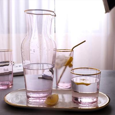 China Creative Rose Gold Plating Crystal Glass with Gold Rim Drinkware Set with Red Wine Glass Cocktail Glass Juice Water Cup and Pitcher Bottle for sale