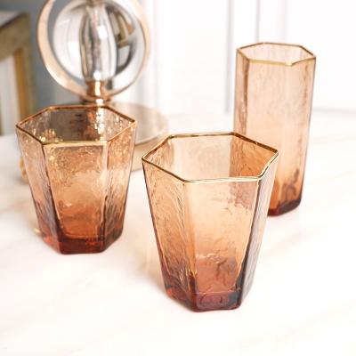 China 2021 New Hexagon Design Hexagon Shape Custom Decorative Stem And Stemless Orange Gold Rim Champagne Wine Glasses Wedding Goblet for sale