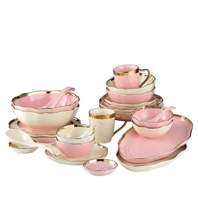 China Viable Irregular Wave Gold Edge Line Ceramic Dinnerware Set With Dish Bowls Dish Bowls And Spoons Pink Beige Dinner Charger Dish Cups for sale