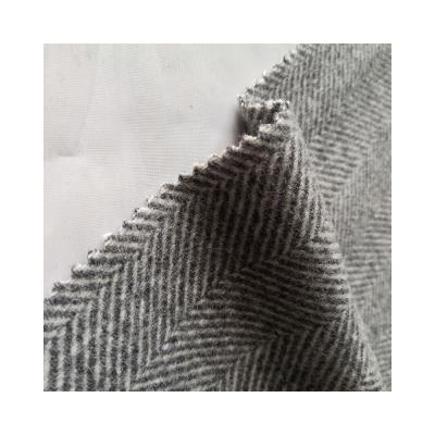 China Sustainable Color 100% Natural Wool Twill Herringbone Solid Fabric For Coat for sale