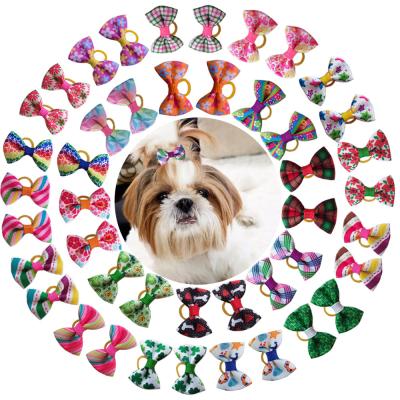 China Viable Wholesale Pet Grooming Hair Bows Dog Accessories Dog Grooming Bows for sale