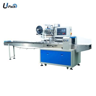 China Beverage flow packing machine for scouring pad steel wool packaging machine sponge wrap packing machinery for sale