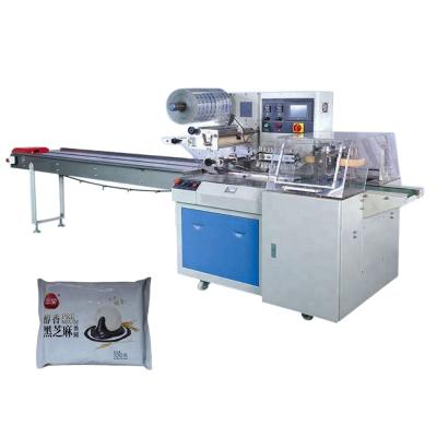 China Food Flow Packaging Machine For Sweet Dumplings With Tray Plastic Flow Packing Machine Of Rice Dumplings With Tray for sale