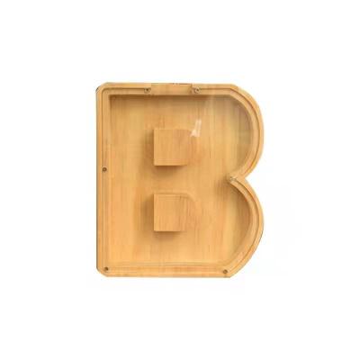 China Money Bank Cans Good Selling Wooden Alphabet Letter Shaped Piggy Bank Money Saving Storage Box For Gift for sale