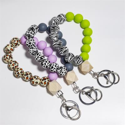 China Silicone Sublimation Bracelet Fashion Best Price Key Chain Wooden Bead Bracelet for sale