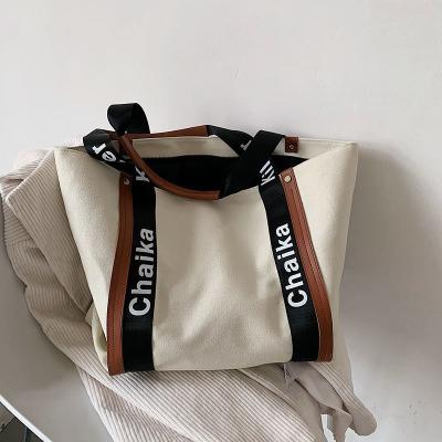 China Lady Bag Women's Fashion Trend 2021 Best Selling New Large Capacity Tote Bag Canvas Hand Bag Portable For Women for sale