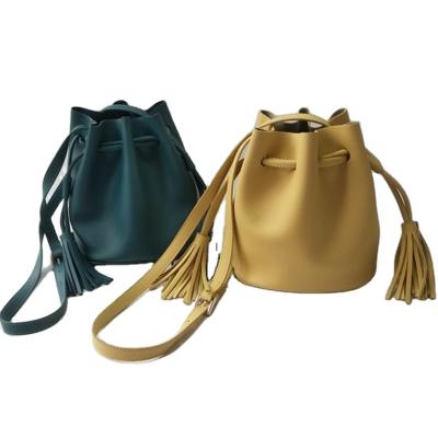 China Lady Latest Design Elegant Solid Drawstring Handbags Soft Material Bucket Bag for sale